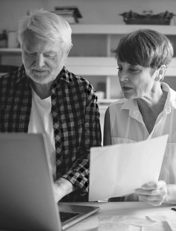 Couple submitting their life insurance information online